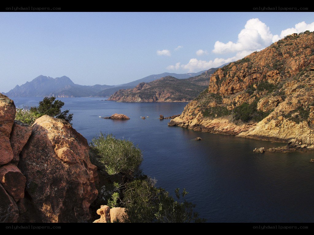 coastal bay with rocky cliffs