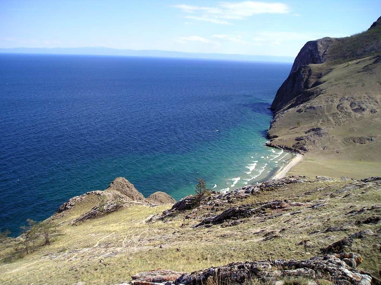 coastal bay with rocky cliffs