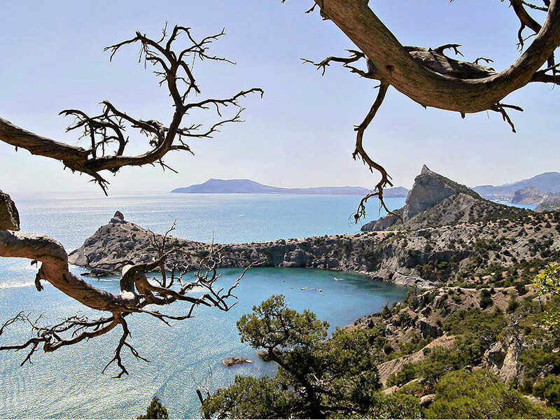 Coastal Bay with Rocky Cliffs — Blue