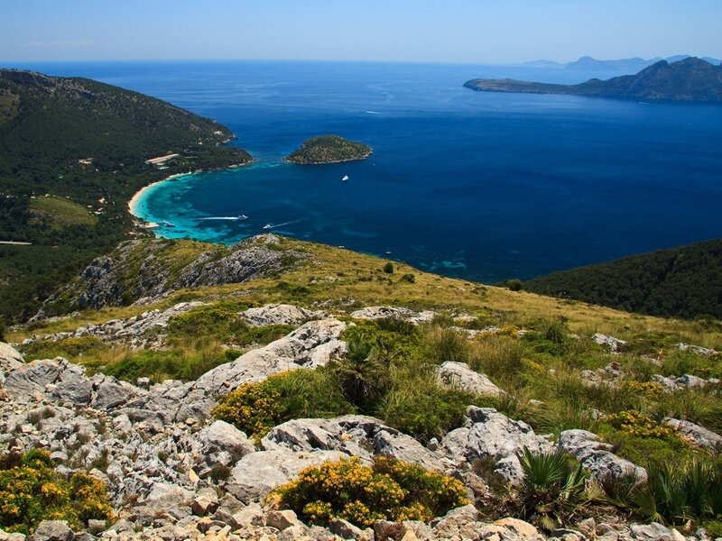 coastal bay with rocky hills