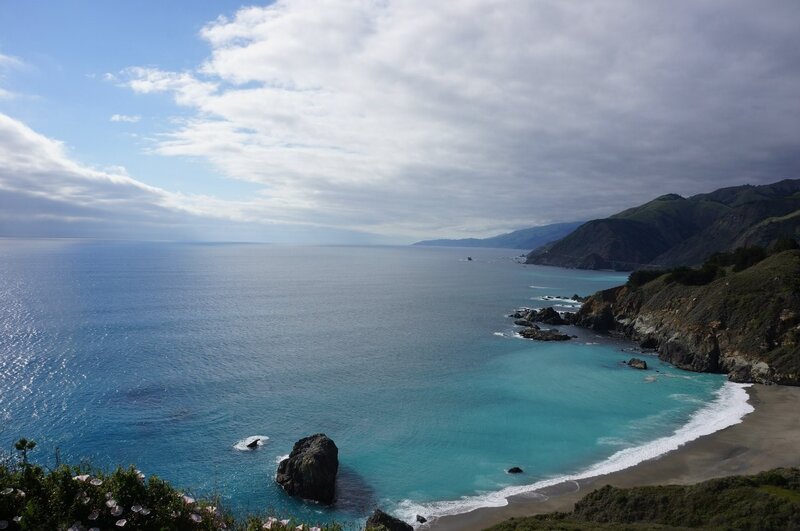 Coastal Bay with Rocky Shore — Blue, Serene, Afternoon