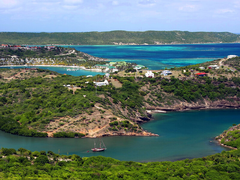 coastal bay with sailboat