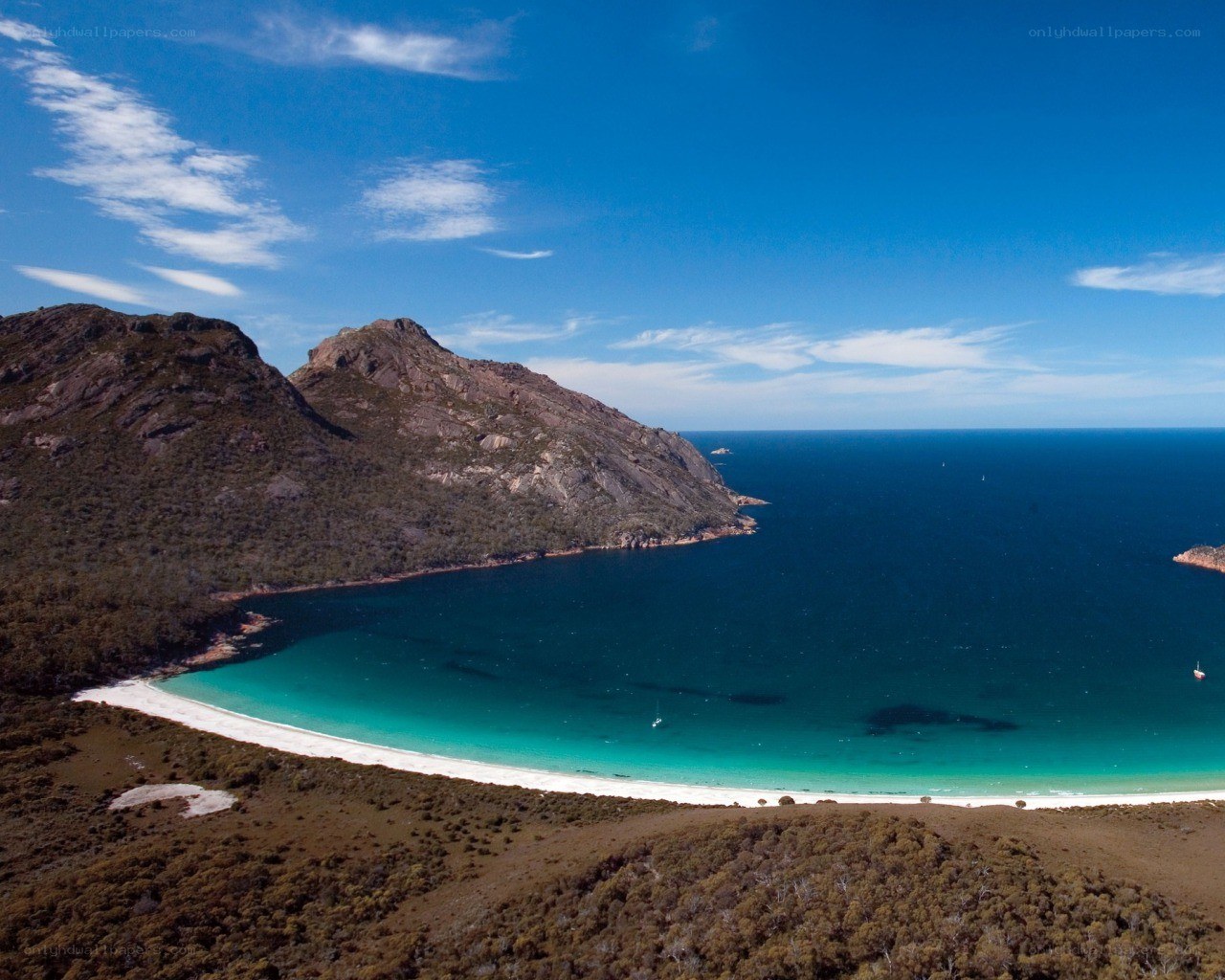 coastal bay with white sand beach