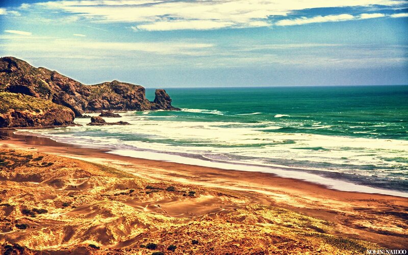 Coastal Beach with Cliffs