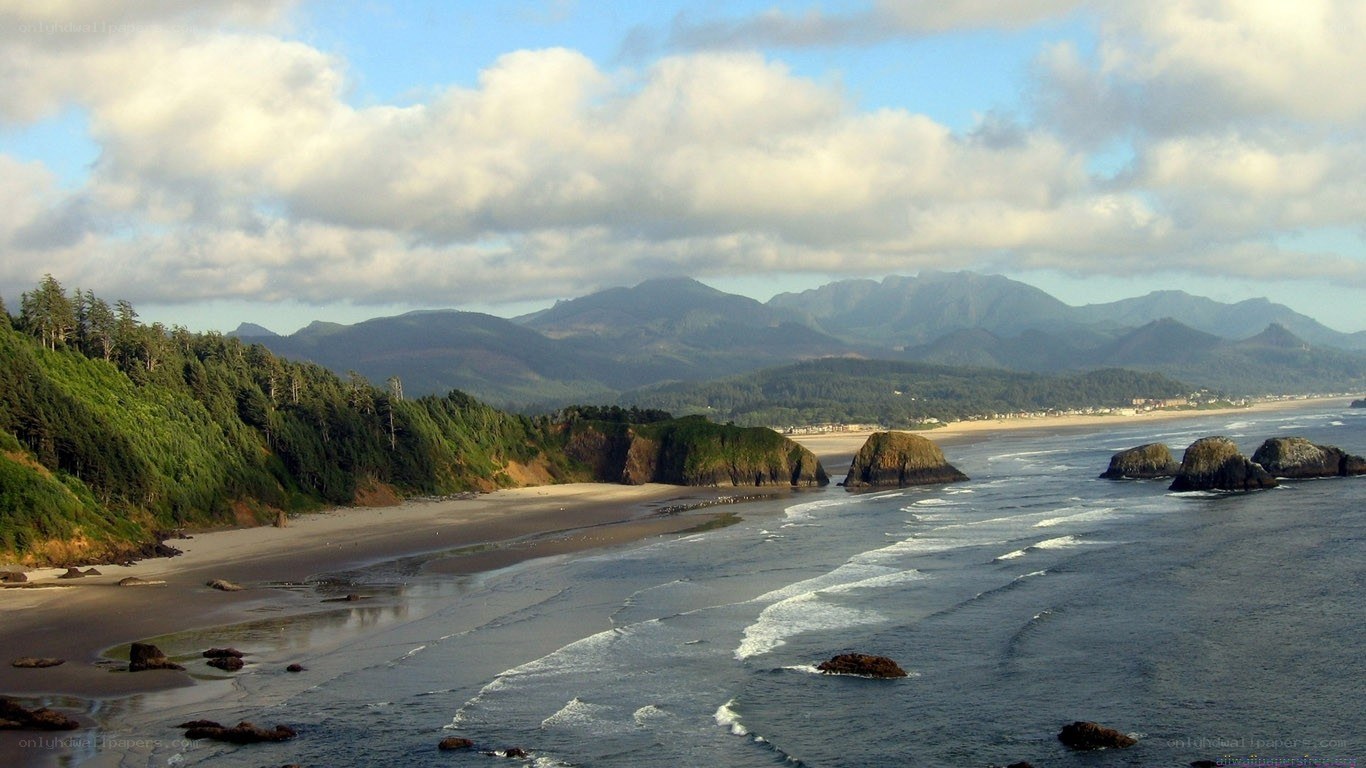 coastal beach with mountains