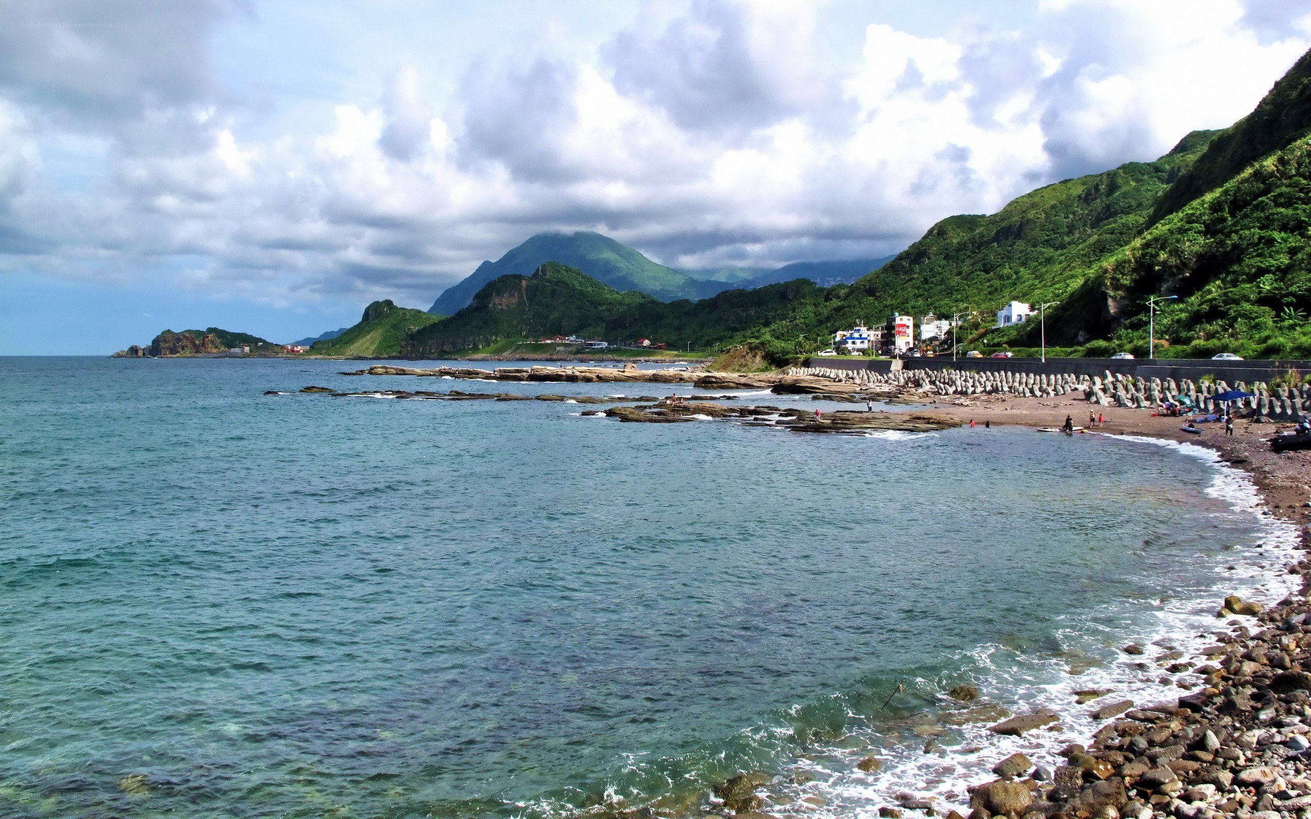 coastal beach with mountains