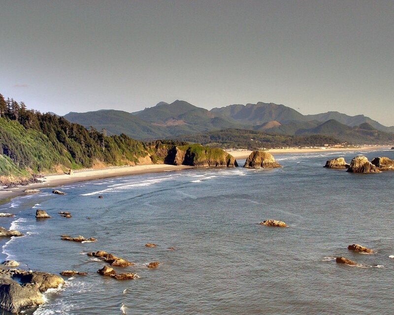 coastal beach with mountains