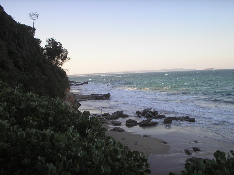 Coastal Beach with Rocks — Blue
