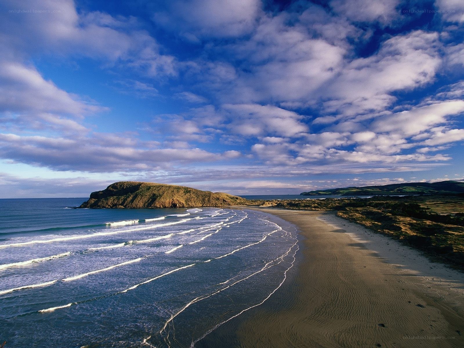 coastal beach with rocky headland