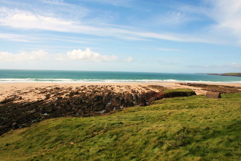 coastal beach with rocky shore