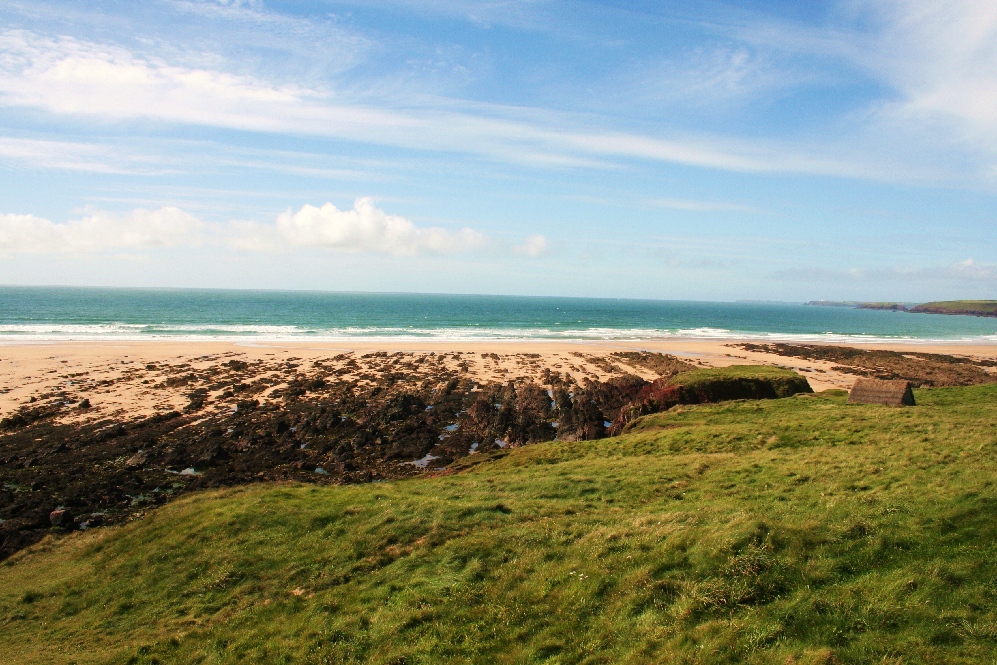 coastal beach with rocky shore