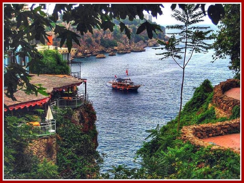 Coastal boat scene with restaurant