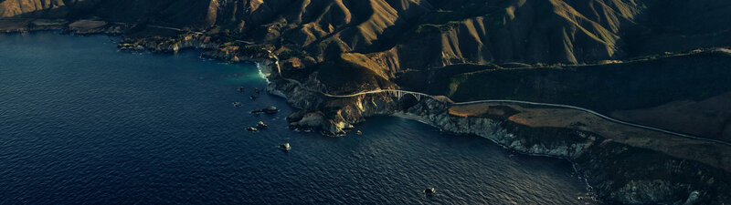 Coastal Bridge over Ocean — Blue