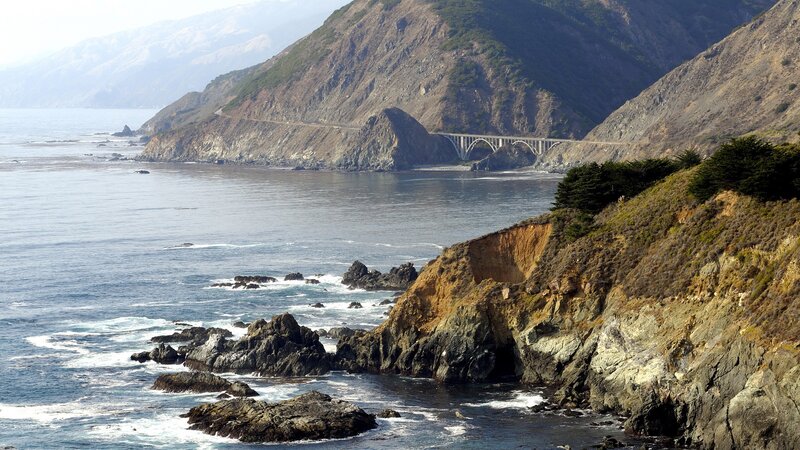 coastal bridge over rocky cliffs