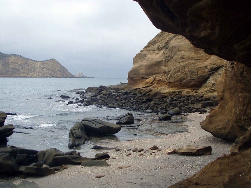 coastal cave with rocky beach
