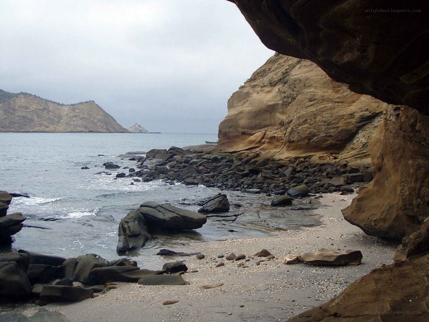 coastal cave with rocky beach