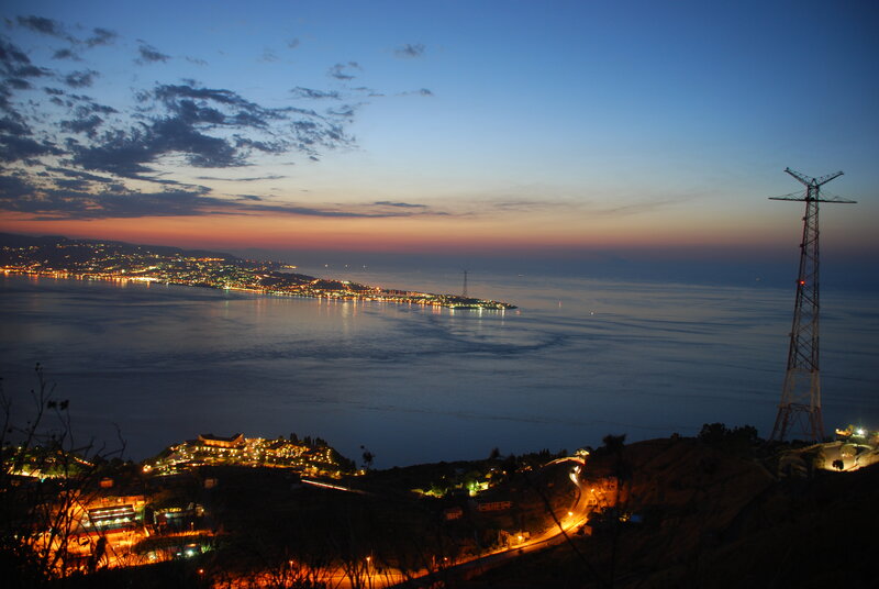 Coastal City at Dusk — Blue, Serene, Night, Photograph, Sea