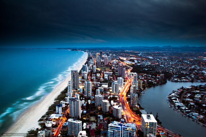 Coastal City at Night — Blue, Dramatic, Photograph, Beach