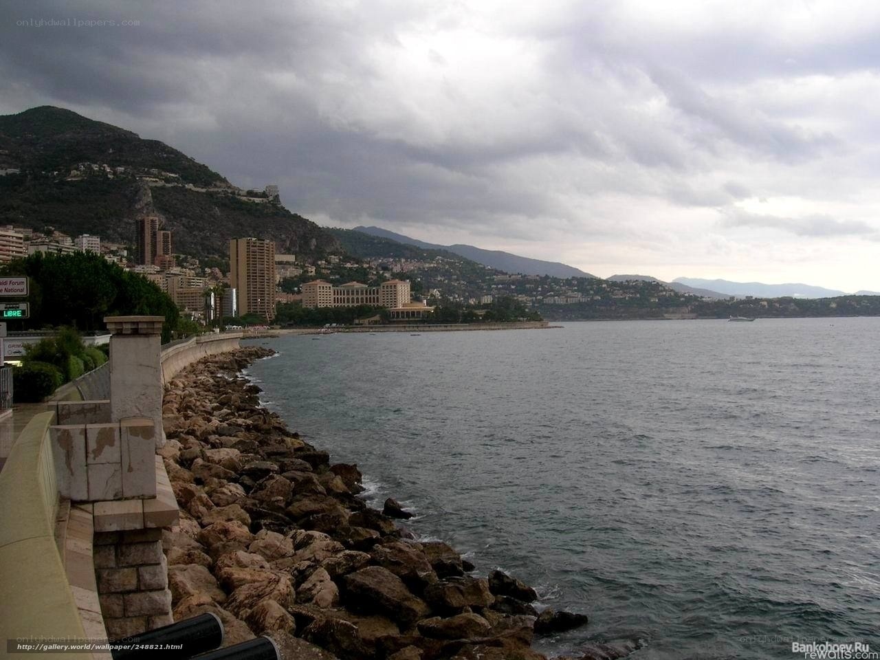 coastal city under cloudy sky