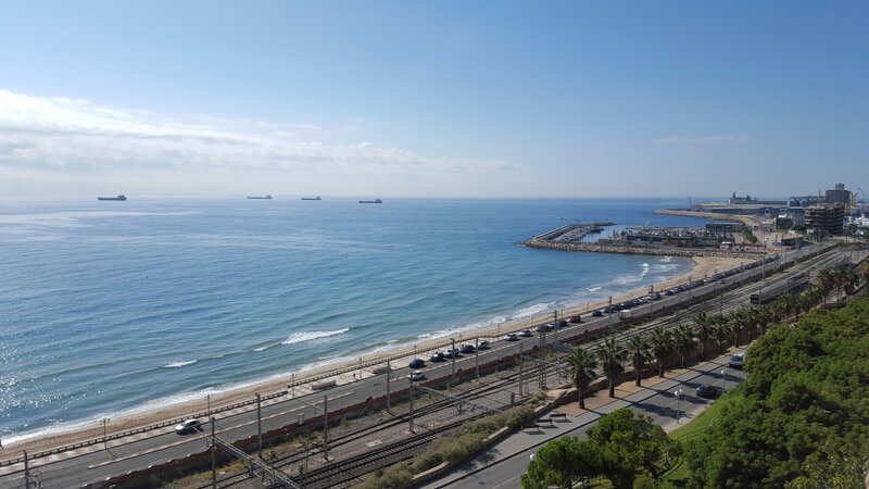 Coastal City View — Blue, Serene, Afternoon, Photograph, Ocean