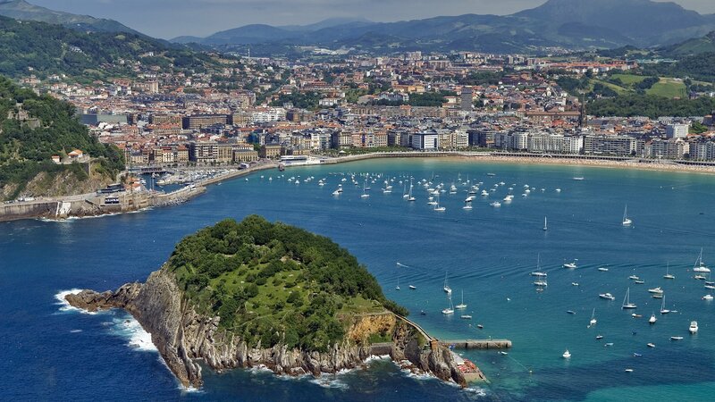 coastal city with harbor and island