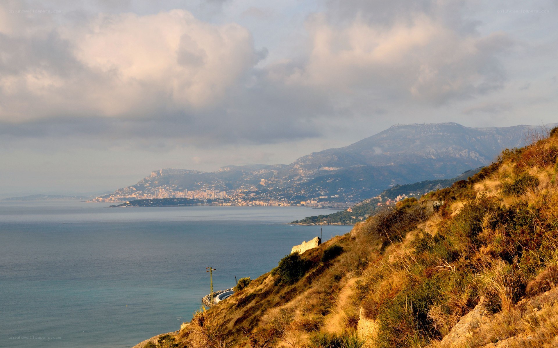 coastal city with mountains