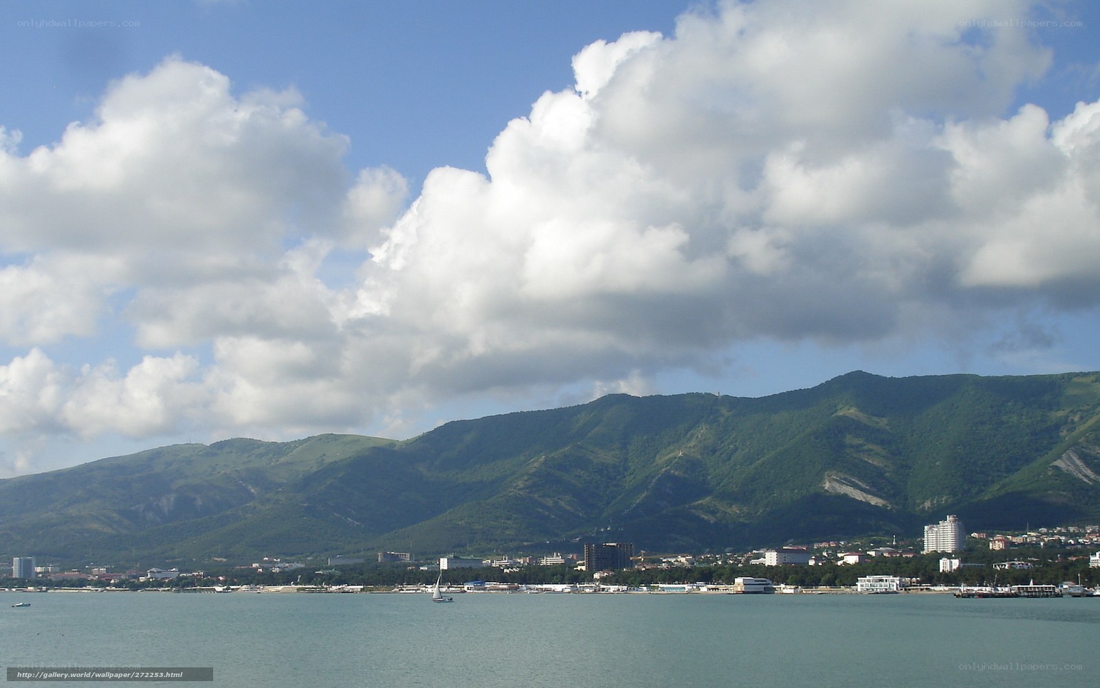 coastal city with mountains