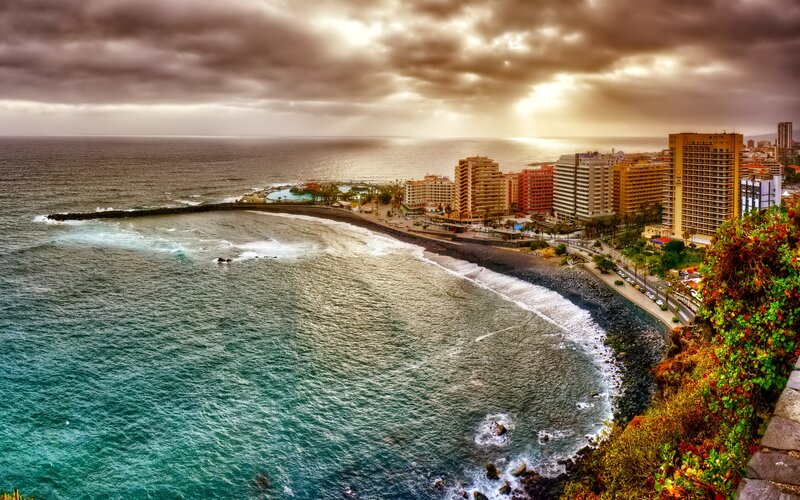 Coastal Cityscape at Sunset — Blue