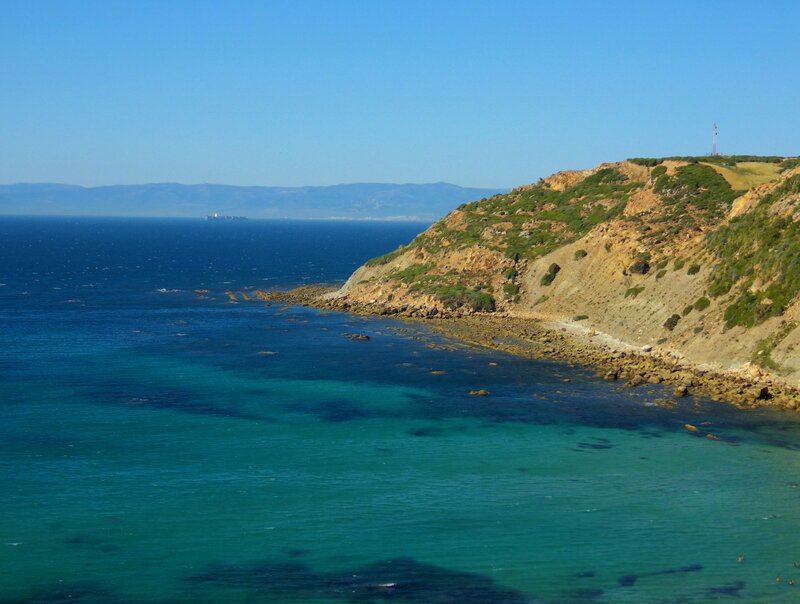Coastal Cliff and Ocean — Blue, Serene, Afternoon, Photograph, Mountains