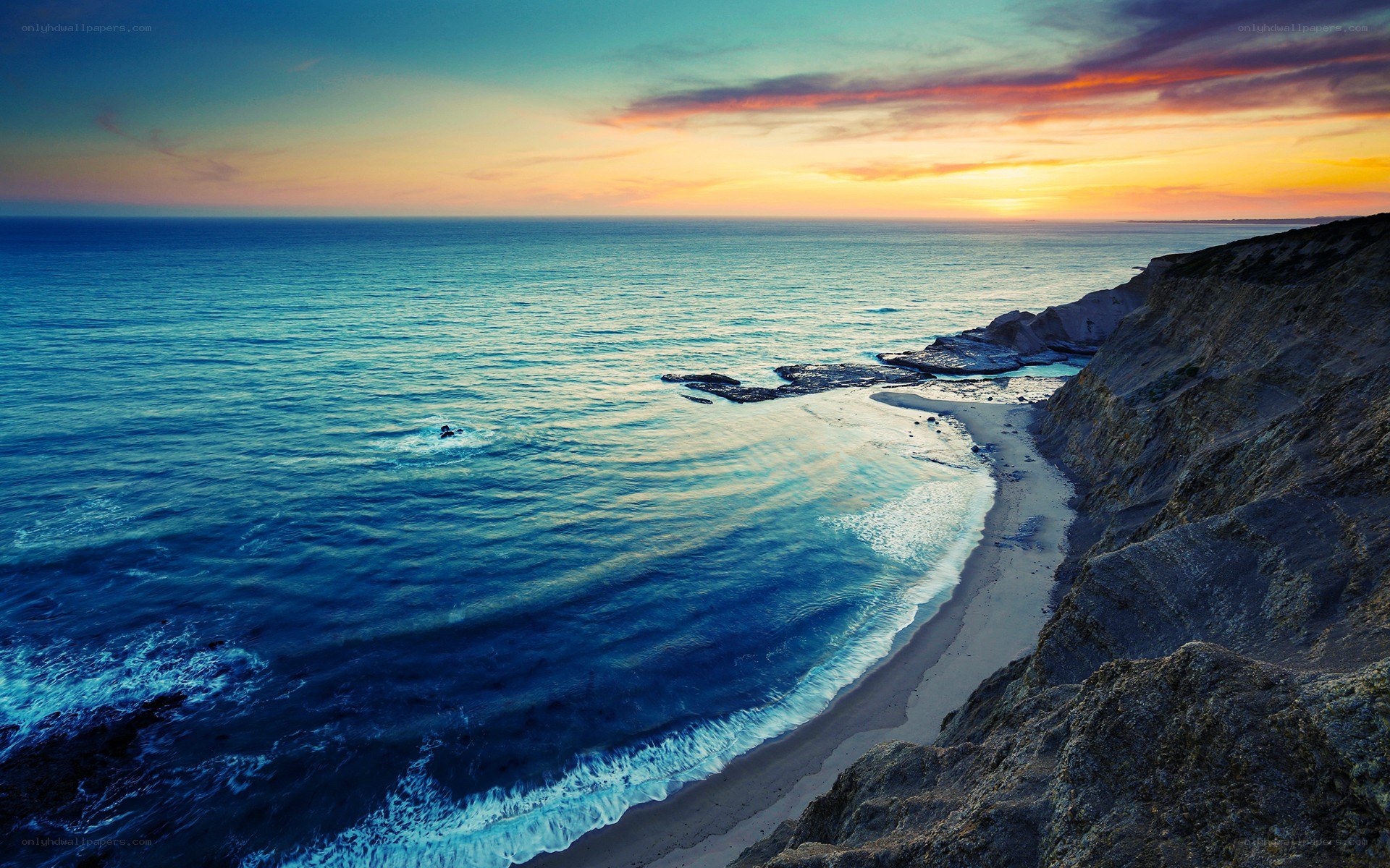 coastal cliff at sunset