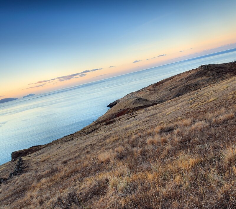Coastal Cliff at Sunset — Blue, Serene, Photograph, Ocean, Sky