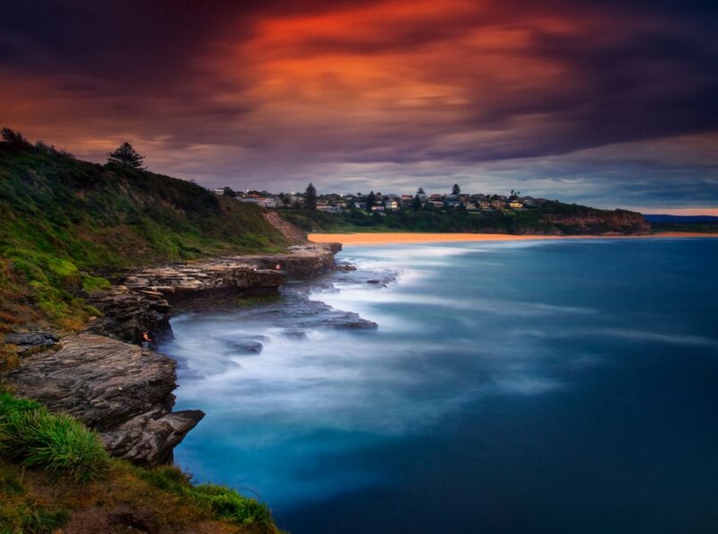 Coastal Cliff at Sunset — Blue