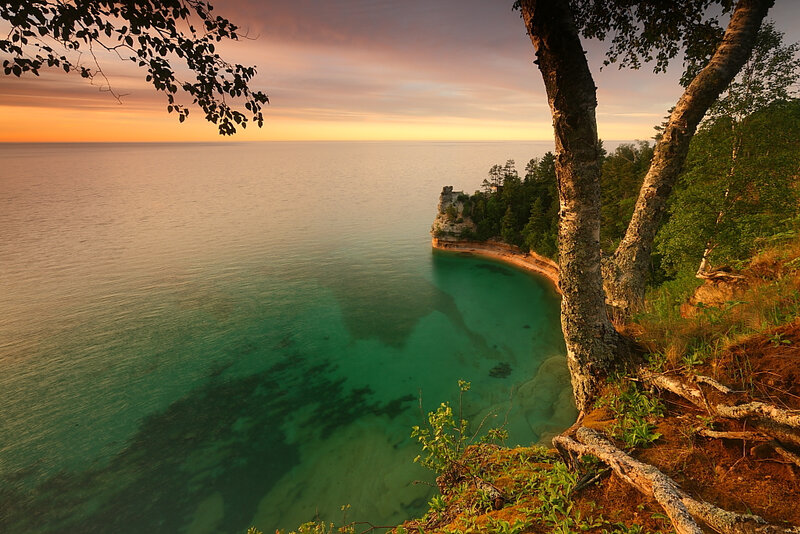 Coastal Cliff at Sunset — Green