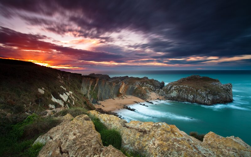 Coastal Cliff at Sunset — Purple