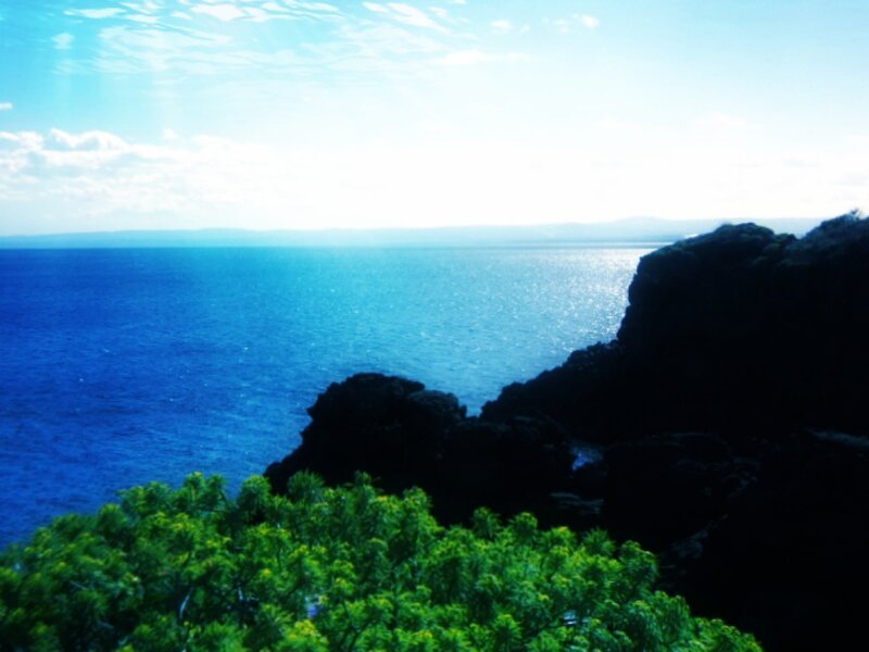 Coastal Cliff View — Blue, Serene, Afternoon, Photograph