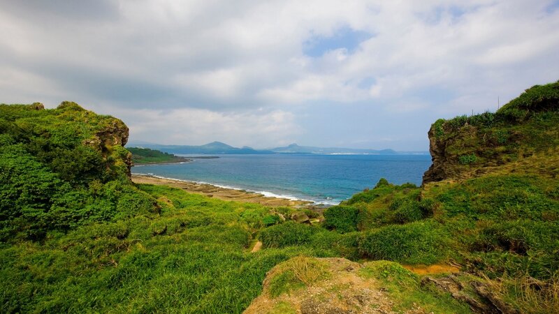 Coastal Cliff View — Green, Serene, Afternoon, Photograph