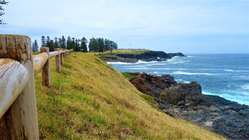 Coastal Cliff with Lighthouse — Blue, Serene