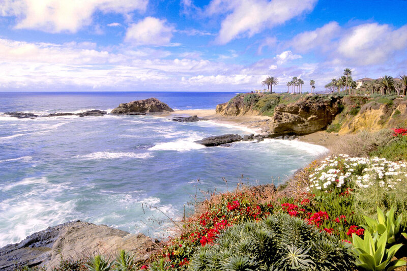 Coastal Cliff with Ocean — Blue, Serene, Afternoon, Photograph, Rocks
