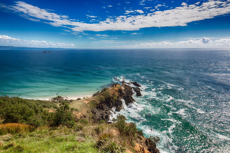 Coastal Cliff with Ocean — Blue, Serene, Afternoon, Photograph, Sky