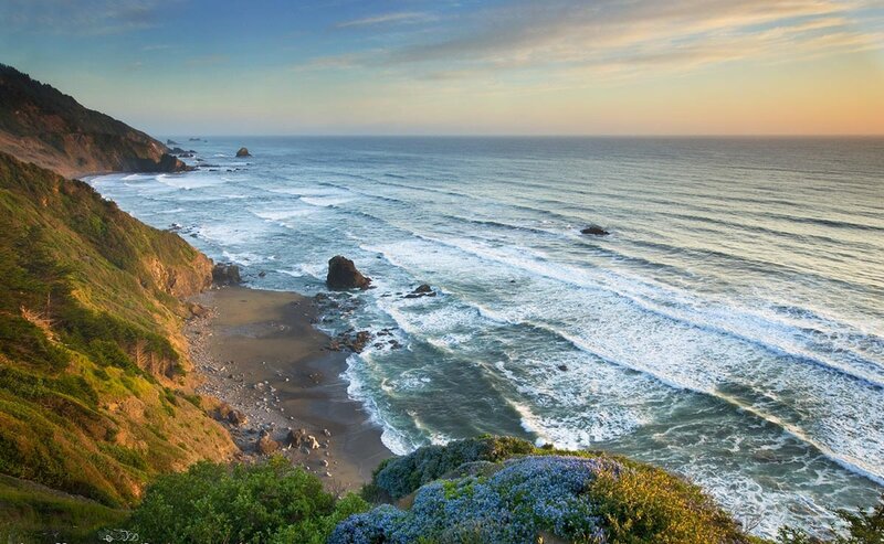Coastal Cliff with Ocean — Blue, Serene, Sunset, Photograph
