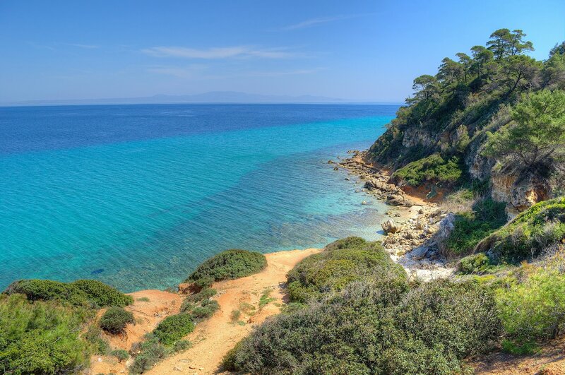 Coastal Cliff with Turquoise Water — Blue, Serene