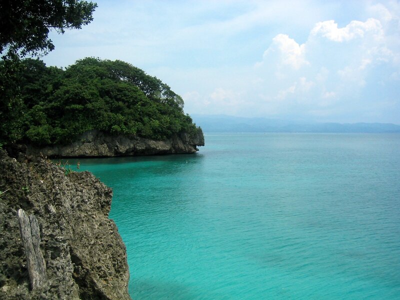 Coastal Cliff with Turquoise Water — Blue