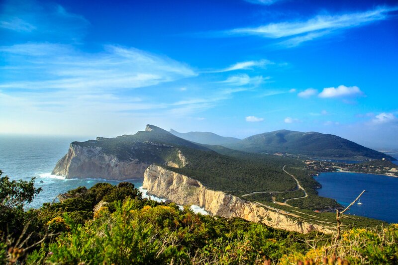 Coastal Cliffs and Bay — Blue