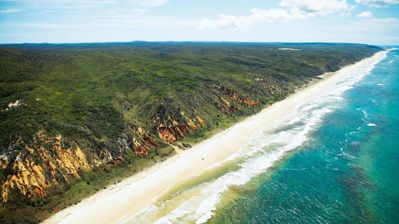 Coastal Cliffs and Beach — Green, Serene