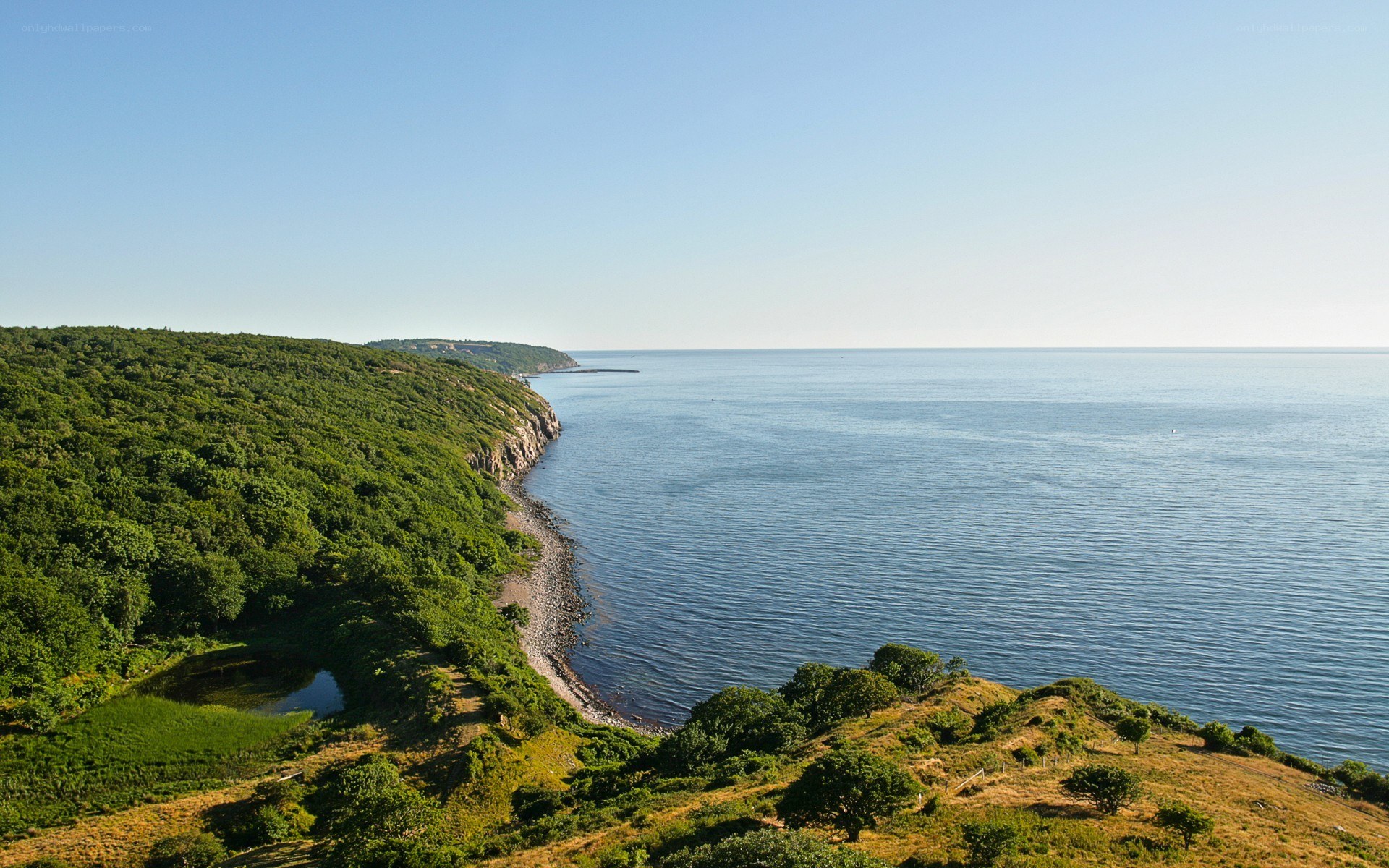 coastal cliffs and calm sea