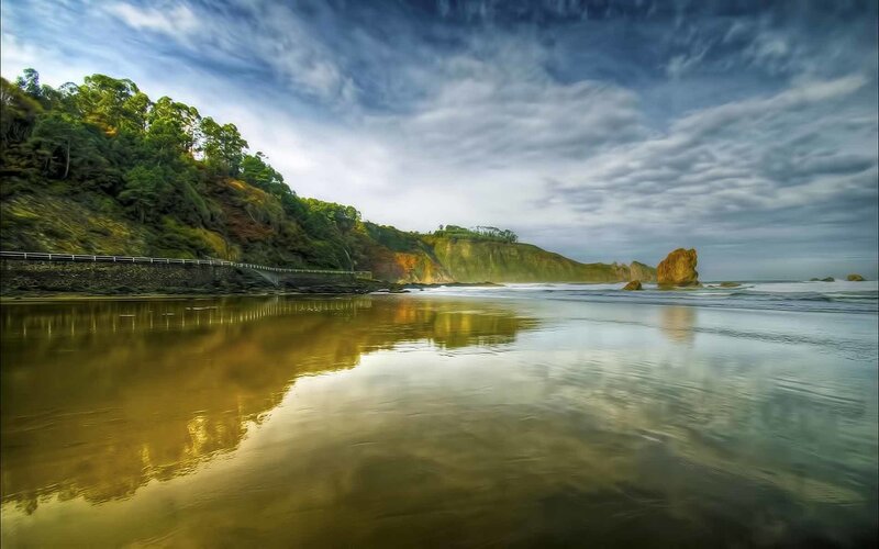 coastal cliffs and calm sea