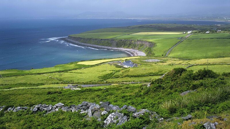 coastal cliffs and green fields