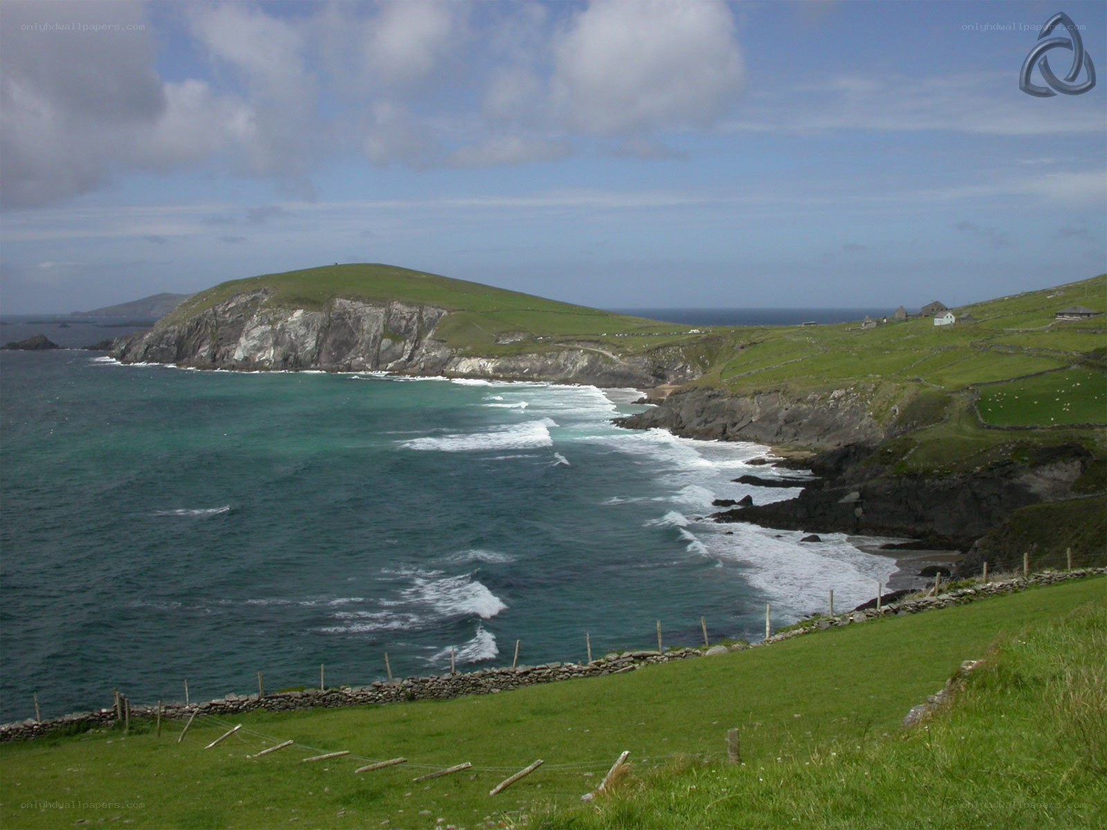 coastal cliffs and green hills