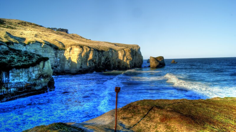 Coastal Cliffs and Ocean — Blue, Dramatic, Afternoon, Photograph, Rock Formation