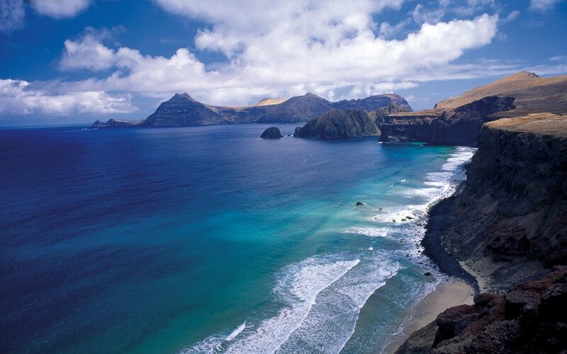 Coastal Cliffs and Ocean — Blue, Serene, Afternoon, Photograph, Island, Clouds